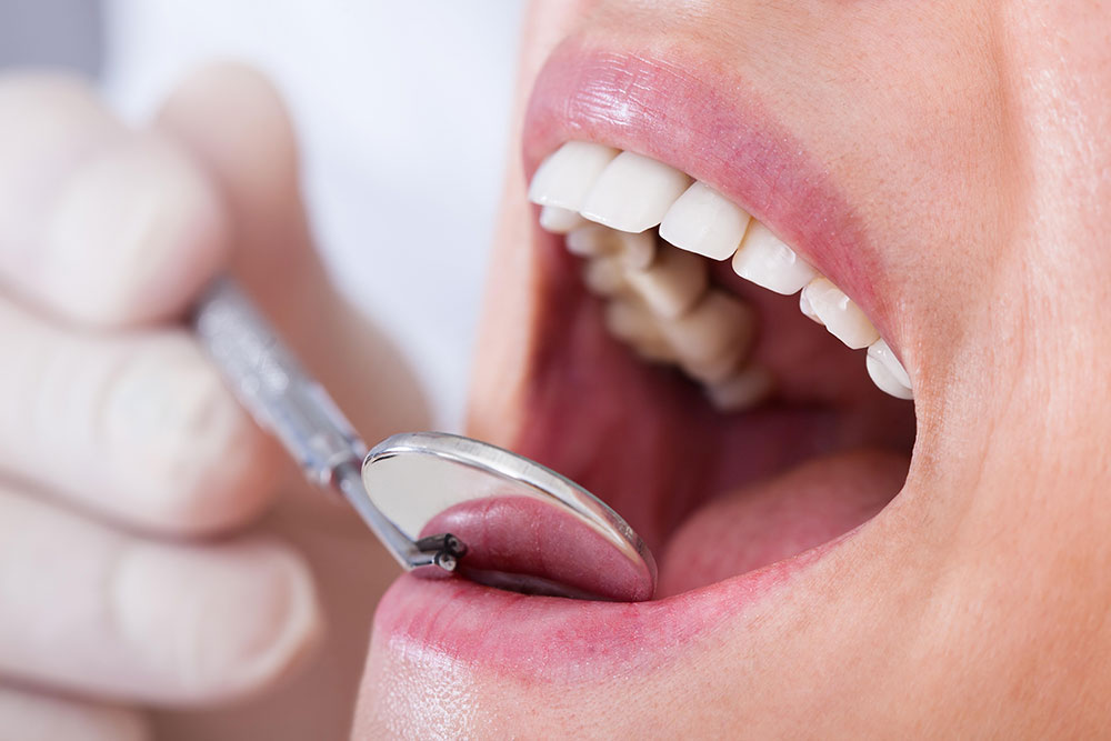 Dentist examining a patient